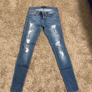 Distressed skinny denim